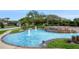 Welcome to Timacuan; a beautiful entrance with fountain and brick signage, enhancing the community's appeal at 468 Alinole Loop, Lake Mary, FL 32746