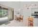 Cozy dining area with sliding glass doors to the patio at 468 Alinole Loop, Lake Mary, FL 32746