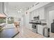 Bright kitchen featuring modern appliances, ample counter space, and a view to the outdoors at 468 Alinole Loop, Lake Mary, FL 32746