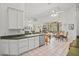 Open kitchen area that flows into the dining space, perfect for Gathering gatherings and easy serving at 468 Alinole Loop, Lake Mary, FL 32746