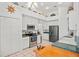 Functional kitchen with stainless steel appliances, white cabinetry, and efficient layout for cooking at 468 Alinole Loop, Lake Mary, FL 32746
