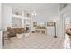 Spacious living room featuring tile floors, neutral paint, and stylish decor for comfortable living and entertaining at 468 Alinole Loop, Lake Mary, FL 32746