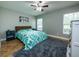 Bedroom with a large window, and turquoise furniture at 485 Nw 71St Ave, Ocala, FL 34482