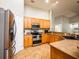 Well-equipped kitchen with stainless steel appliances, ample counter space, and modern cabinetry at 485 Nw 71St Ave, Ocala, FL 34482