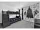 Modern bedroom with bunk beds and Star Wars themed decor at 518 Marcello Blvd, Kissimmee, FL 34746