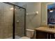 Bathroom features a walk-in shower with tile surround, vanity with granite counters, and neutral wall paint at 531 Lasso Dr, Kissimmee, FL 34747