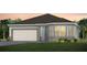 Charming home exterior with a neutral color palette, a two-car garage, and bay windows at 5512 Settlingstone Ln, St Cloud, FL 34771