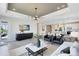 Open living area with a modern TV console and comfortable seating at 5512 Settlingstone Ln, St Cloud, FL 34771