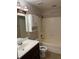 Bathroom featuring vanity with sink, mirror, toilet, and shower/tub at 581 Farmingham Ct, Oviedo, FL 32765