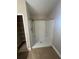 Bathroom featuring shower and shelving at 581 Farmingham Ct, Oviedo, FL 32765