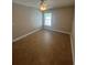 Small bedroom with tile flooring and window at 581 Farmingham Ct, Oviedo, FL 32765