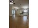 Open kitchen and living room featuring island and stainless appliances at 581 Farmingham Ct, Oviedo, FL 32765
