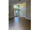 Bright and airy living room with high ceilings, tile flooring and a large window at 581 Farmingham Ct, Oviedo, FL 32765