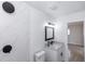Modern bathroom featuring updated fixtures and tiled shower at 657 Lear Ter, Deltona, FL 32725