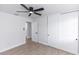 Bedroom featuring ceiling fan and closet with sliding doors at 657 Lear Ter, Deltona, FL 32725