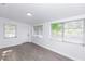 Bright bedroom features neutral paint and flooring, plus windows for natural light at 657 Lear Ter, Deltona, FL 32725