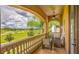 Balcony with golf course views and comfortable seating at 7411 Excitement Dr, Reunion, FL 34747
