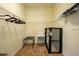 Walk-in closet with organization system, carpeting, and storage at 7411 Excitement Dr, Reunion, FL 34747