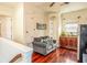 Living room with sofa and wet bar at 7411 Excitement Dr, Reunion, FL 34747