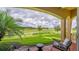 Back patio area overlooking golf course at 7411 Excitement Dr, Reunion, FL 34747