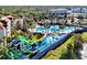 Overhead view of the community water park featuring colorful slides and play areas for all ages at 7754 Teascone Blvd, Kissimmee, FL 34747
