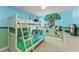 Colorful bedroom with a bunk bed and cheerful Mickey Mouse wall art at 7754 Teascone Blvd, Kissimmee, FL 34747
