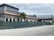 Exterior of building under construction; steel frame and concrete block with a chain link fence at 7900 S Orange Blossom Trl # 1099, Orlando, FL 32809