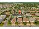 Neighborhood aerial view of well-manicured homes, some featuring pools, with mature trees at 7974 Chilton Dr, Orlando, FL 32836
