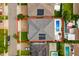 Aerial view of a home with a pool and patio in a residential neighborhood at 7974 Chilton Dr, Orlando, FL 32836