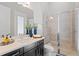 Modern bathroom featuring a shower, stylish vanity, and contemporary fixtures at 7974 Chilton Dr, Orlando, FL 32836