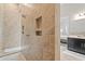 This bathroom features a large walk-in shower and dual sink vanity at 7974 Chilton Dr, Orlando, FL 32836