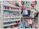 Organized closet with shelving and hanging rods, perfect for storage at 7974 Chilton Dr, Orlando, FL 32836