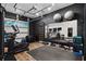 Garage transformed into a home gym featuring modern exercise equipment at 7974 Chilton Dr, Orlando, FL 32836