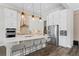Bright kitchen features a center island, modern appliances, and plenty of cabinet space at 7974 Chilton Dr, Orlando, FL 32836