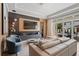 Beautiful living room with large sliding glass doors and neutral tones throughout at 7974 Chilton Dr, Orlando, FL 32836