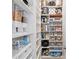 Organized pantry with ample shelving for storage and appliances at 7974 Chilton Dr, Orlando, FL 32836
