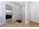 Clean bathroom with a glass-enclosed shower and an open doorway to the bedroom at 9348 Meadow Hunt Way, Winter Garden, FL 34787
