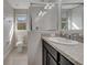Modern bathroom featuring a single sink, a tiled floor, and a glass shower stall at 9559 Silver Buttonwood St, Orlando, FL 32832