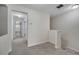 Hallway space with carpet, neutral walls, and entryways to other areas of the home at 9559 Silver Buttonwood St, Orlando, FL 32832
