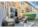 Cozy outdoor patio area with comfortable seating and a well-maintained garden at 9559 Silver Buttonwood St, Orlando, FL 32832