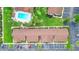 Overhead view of the condominium complex showing the community pool and parking lots at 101 Grand Plaza Dr # P6, Orange City, FL 32763
