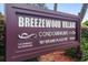 Sign for Breezewood Village Condominiums at 101 Grand Plaza Dr, a +55 community at 101 Grand Plaza Dr # P6, Orange City, FL 32763