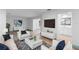 Well-lit living room with neutral tones, showcasing an open layout and modern decor at 101 Grand Plaza Dr # P6, Orange City, FL 32763
