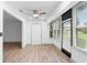 A sunlit living space with a door leading to the outside and connecting seamlessly to the dining area at 101 Grand Plaza Dr # P6, Orange City, FL 32763