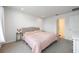 Comfortable bedroom featuring soft carpet, a cozy bed, and natural light from the windows at 10221 Highline Crest St, Orlando, FL 32832