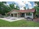 Community poolside pavilion offering shade and seating for relaxation with tables and benches at 104 Forest Point Ln, Longwood, FL 32779