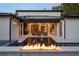 Backyard pool featuring a cozy outdoor seating area with a grill and a fireplace water feature at 1211 Munster St, Orlando, FL 32803