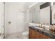 Chic bathroom featuring a glass-enclosed shower, unique vanity, and elegant fixtures, offering a spa-like experience at 1211 Munster St, Orlando, FL 32803