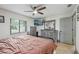 Bright bedroom with a ceiling fan, and neutral-toned walls at 1360 Gladiolas Dr, Winter Park, FL 32792