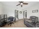 Bedroom area features an expansive layout with a chair, desk, and luxury seating at 1360 Gladiolas Dr, Winter Park, FL 32792